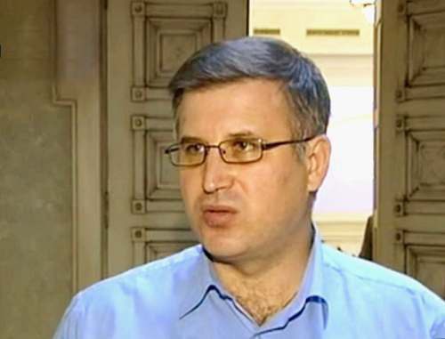 Политолог Андрей Епифанцев. Кадр из видеорепортажа телеканала РБК-ТВ от 26 августа 2011 г.