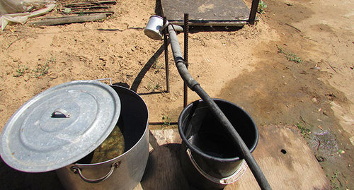Питьевая вода в вёдрах. Фото Вячеслава Ященко для "Кавказского узла"