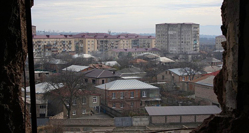 Вид Цхинвала из окна разрушенной квартиры на седьмом этаже, декабрь 2013 год. Фото Марии Котаевой для "Кавказского узла"
