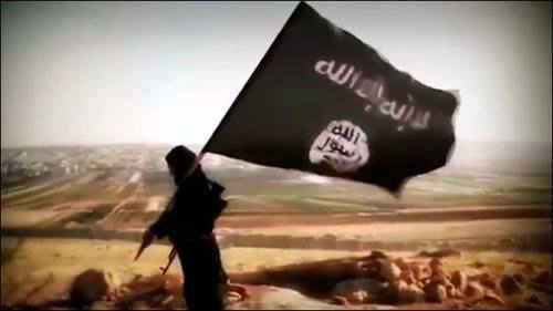 Флаг «Исламского государства» (ИГ — признано террористической организацией, его деятельность в России запрещена). Фото: VostockPhoto http://www.vostock-photo.com/