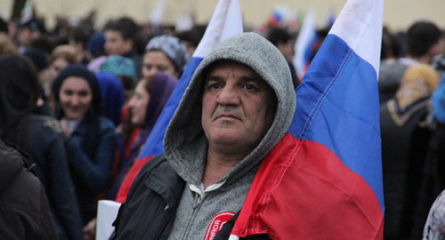 Участник митинга в Грозном, март 2015 года. Фото Ахмеда Альдебирова для "Кавказского узла" 
