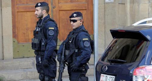 Сотрудники полиции в Италии. Фото Макс Росси, Reuters