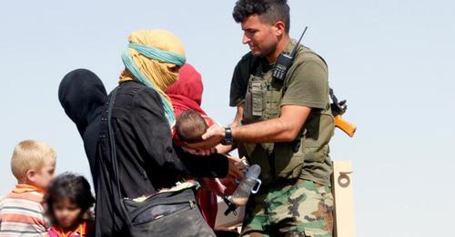Женщина с детьми, Ирак. Фото: REUTERS/Ako Rasheed