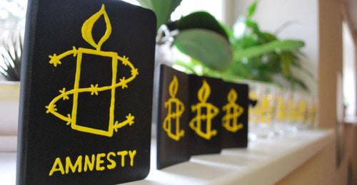 Логотип Amnesty International. Фото: Diana Ralleanu (RFE/RL)