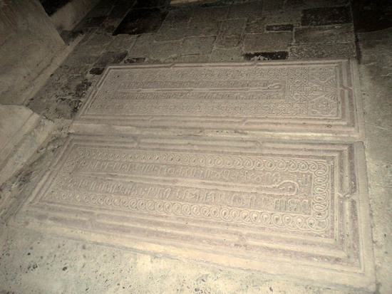 Надгробные плиты в притворе монастыря.