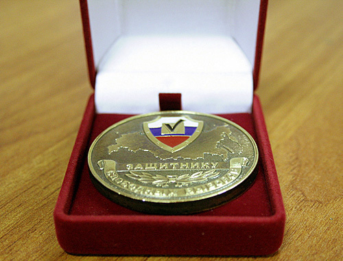Медаль "Защитнику свободных выборов". Фото с сайта http://golos.org