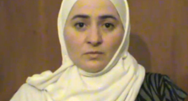 Кадр из видеообращения Пятимат Хашагульговой, распространенного в Интернете 15 марта 2011 г. Источник: YouTube.ru