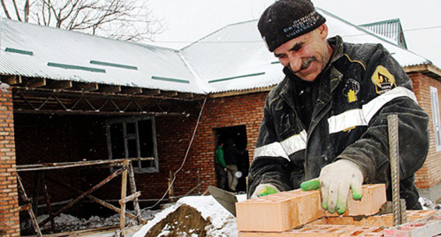 Строительство жилого дома в ходе реконструкции 12-го участка в Октябрьском районе Грозного. 20 декабря 2012 г. Фото Ибрагима Эстамирова, http://www.grozny-inform.ru