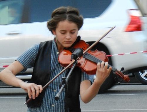 Участница акции протеста "За честные выборы". Волгоград, 13 сентября 2013 г. Фото Татьяны Филимоновой для "Кавказского узла"