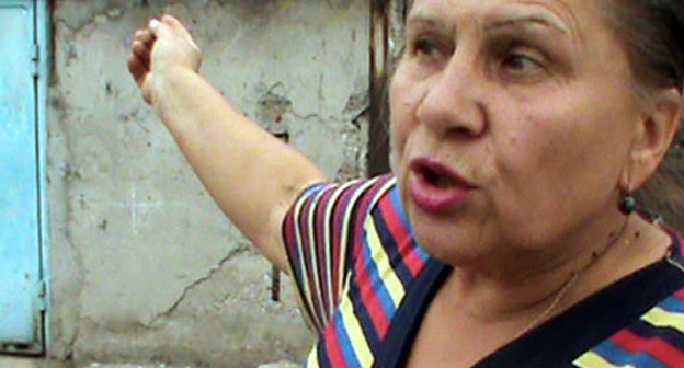 Галина Анохова, жительница одного из бараков на улице Горького. Нальчик, сентябрь 2013 г. Кадр видеорепортажа "Кавказкого узла"