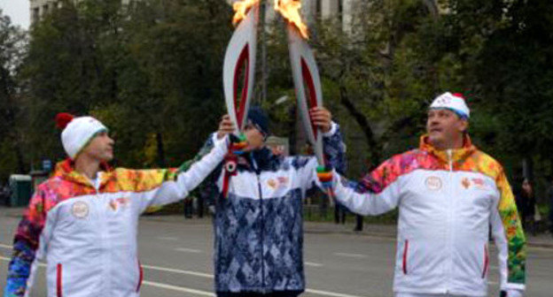 Эстафета Олимпийского огоня в Москве. Октябрь 2013 г. Фото: RFE/RL