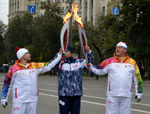 Эстафета Олимпийского огоня в Москве. Октябрь 2013 г. Фото: RFE/RL