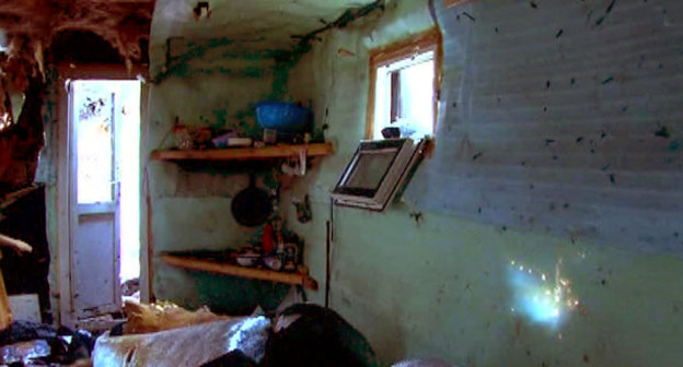 Блиндаж, обнаруженный в районе боестолкновения в Гумбетовском районе Дагестана. 17 марта 2014 г. Фото НАК, http://nac.gov.ru/nakmessage/2014/03/18/v-gumbetovskom-raione-dagestana-neitralizovany-dva-bandita.html