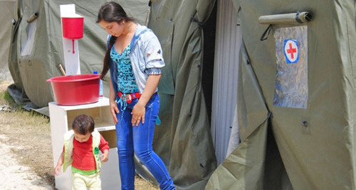 Беженцы с Украины, размещенные в палаточном городке в Ростовской области. Июнь 2014 г. Фото: ГУ МЧС России по Ростовской области