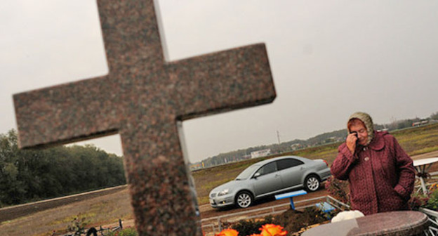 Могила одного из погибших в станице Кущевской. Фото: Максим Тишин/Югополис