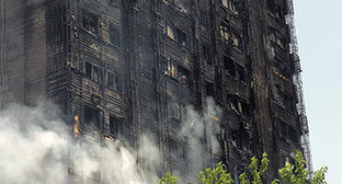 Пожар в многоэтажно доме в Баку. Фото: http://echo.az/article.php?aid=83986