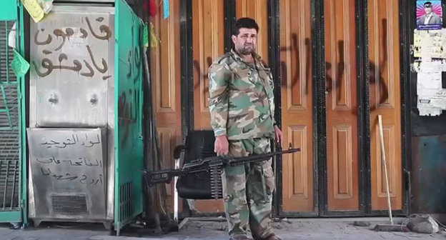 Солдат ССА (Свободная армия Сирии) на улице Алеппо. Сирия. Фото https://ru.wikipedia.org