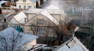 Место проведения спецоперации на улице Циолковского. 15 января 2016 года. Фото: скриншот из видеозаписи очевидца спецоперации, Youtube.com