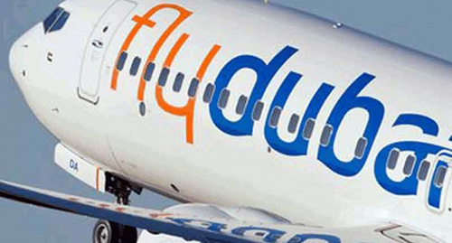 Логотип FlyDubai на борту самолёта. Фото:  http://www.light-fly.ru/news/Aviakompaniia_Flydubai_Obnarodovala_Tarify_Na_Osienniie_Rieisy_Iz_Moskvy_V_Dubai