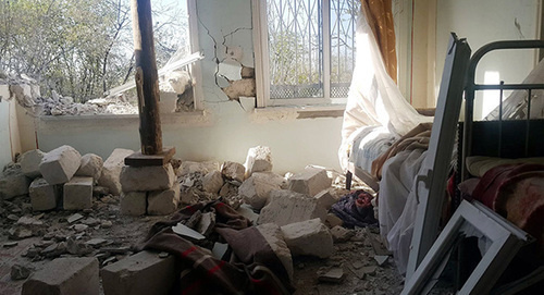 Дом, разрушенный при обстреле. Фото: © Sputnik/ Ayaz Yashilyarpaq, http://ru.sputnik.az/karabakh/20160428/404900539.html