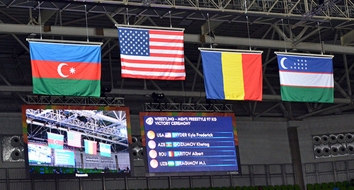 Флаги стран-медалистов на церемонии награждения. Фото: © SPUTNIK/ MURAD FARZALIYEV