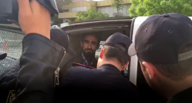 Гияс Ибрагимов (в центре). Фото: RFE/RL