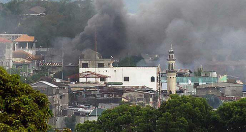 Пожар в г. Марави от боевых действий, 28 мая 2017, Филиппины. Фото http://warsonline.info/filippines/blog.html