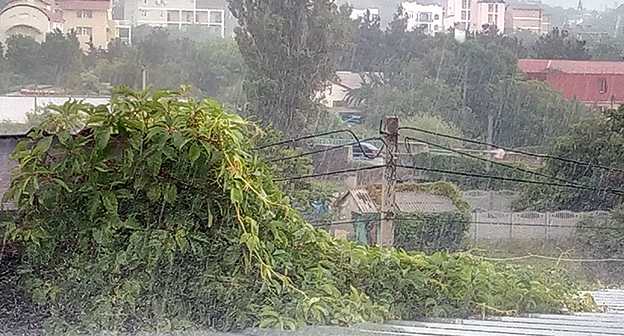 Дождь в горном поселке. Фото Нины Тумановой для "Кавказского узла"