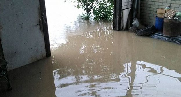 Подтопление после ливня в Тимашевске. Фото kpcdn.net