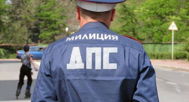 Сотрудник ДПС. Фото http://myzarya.ru/forum1/index.php?p=66521&showtopic=3373&st=120