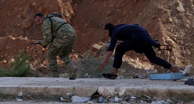 Война в Сирии. Фото: REUTERS/Khalil Ashawi