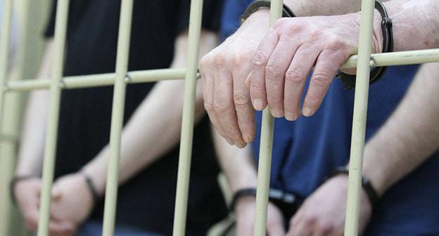 Задержанные за решеткой. Фото © Sputnik/ Евгений Биятов

