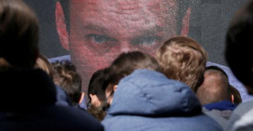 Алексей Навальный на экране общается со своими сторонниками. Москва, 24 декабря 2017 г. Фото: REUTERS/MAXIM SHEMETOV Алексей Навальный на экране общается со своими сторонниками. Москва, 24 декабря 2017 г. Фото: REUTERS/MAXIM SHEMETOV