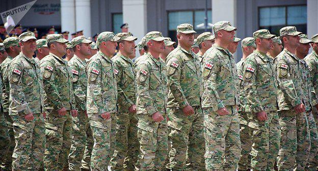 Грузинские военнослужащие. Фото © Sputnik / Alexander Imedashvili
https://sputnik-georgia.ru/politics/20180207/239217378/Voennaja-reforma-v-Gruzii-prezidentu-dali-pravo-objavljat-mobilizaciju.html