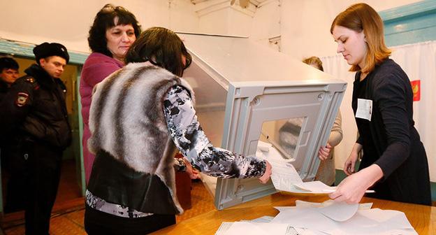 Подсчет голосов. Выборы президента России. 18 марта 2018 г. Фото: REUTERS/Ilya Naymushin