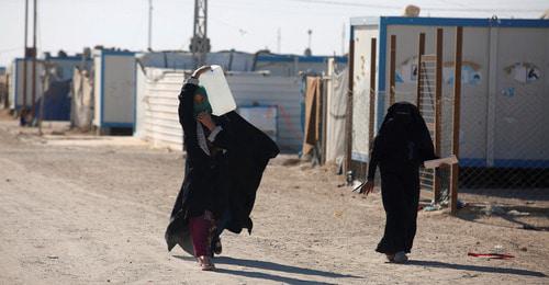 Женщины в лагере беженцев в Ираке. Фото: REUTERS/Khalid al-Mousily
