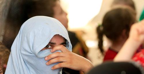 Мусульманская девушка. Фото: REUTERS/Alaa Al-Marjani
