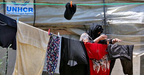 Сирийские беженцы. Фото: REUTERS/Ali Hashisho