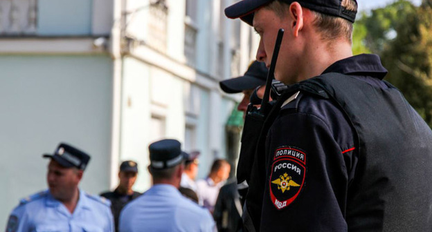 Сотрудники полиции. Фото: Oleg Kamushkin (RFE/RL)