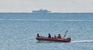 Поисковый катер на месте крушения Ту-154 в Сочи. 26 декабря 2016 г. Фото: REUTERS/Maxim Shemetov