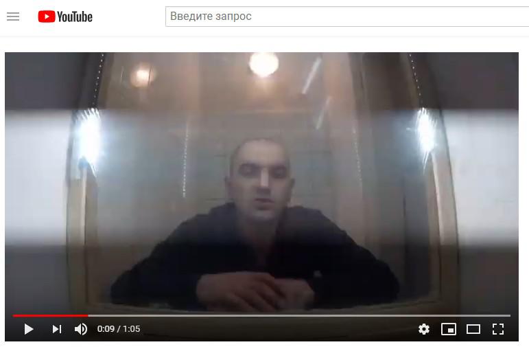 Скриншот видео, в котором Аслан Черкесов жалуется на условия для встречи с адвокатом. https://www.youtube.com/watch?v=rhJ_TmHLO_s&feature=share