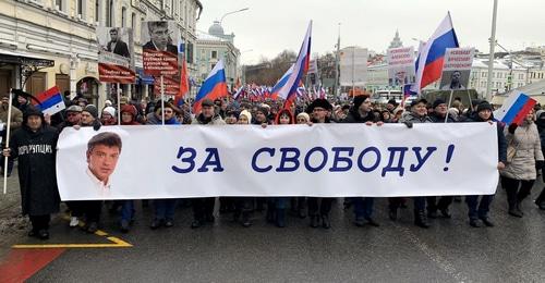Плакат "За свободу!" с портретом Немцова.  Москва, 24 февраля 2019 года. Фото Олега Краснова для "Кавказского узла".