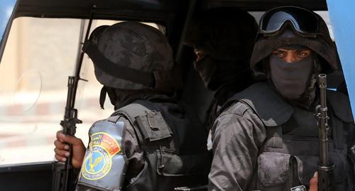 Сотрудники полицейского спецназа. Фото REUTERS/Mohamed Abd El Ghany