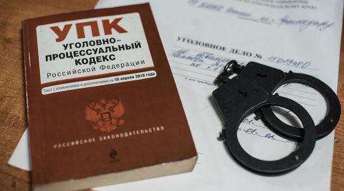 Наручники и уголовный кодекс © Фото Елены Синеок, Юга.ру