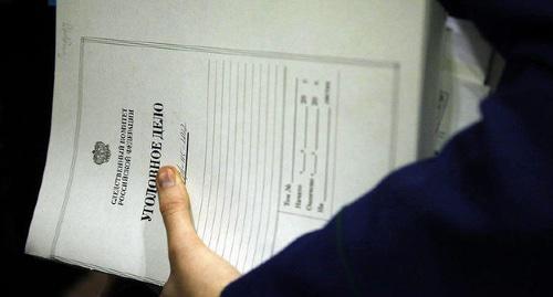 Папка с материалами уголовного дела. Фото Влада Александрова, Юга.ру
