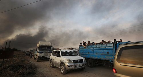 Эвакуация людей из-под обстрелов в Сирии. 9 октября 2019 г. Фото: REUTERS/Rodi Said