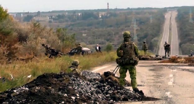 Блокпост украинских войск в Донбассе, 10 сентября 2014 года. Стоп-кадр видео YouTube канала "Новости Украины и мира от FaceNews.ua" - https://www.youtube.com/watch?v=xaC9U8iyE9M&list=UUHNtpc8GinEvlP9sNg_Ad-A