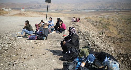 Женщины в зоне боевых действий в Сирии. Фото: REUTERS/Muhammad Hamed