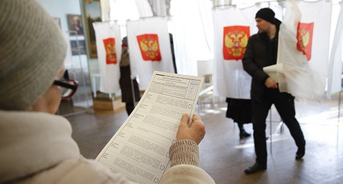 На избирательном участке. Фото: REUTERS/David Mdzinarishvili