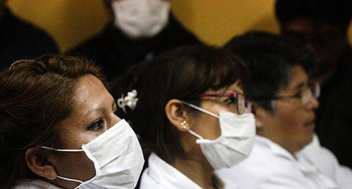 Медицинский персонал в масках. Фото: REUTERS/David Mercado